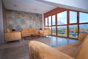 Zona de estar de Apartahotel & Spa Jacetania