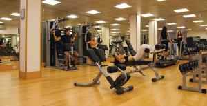 a group of people in a gym doing exercises at Parco dei Principi in Sorrento