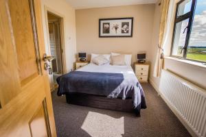 Letto o letti in una camera di Castle View House