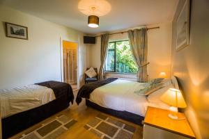 Letto o letti in una camera di Castle View House