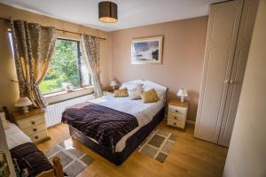 Letto o letti in una camera di Castle View House