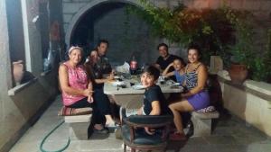 a group of people sitting at a table at Mozaik Stone Hotel in Avanos