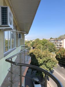 a balcony with a view of a street at Kechkemet Hotel in Simferopol