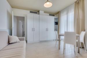 Posedenie v ubytovaní Apartaments Suites Ambassador
