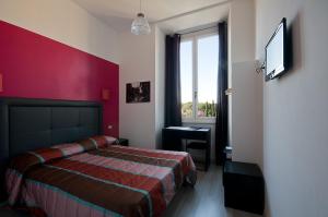 Postel nebo postele na pokoji v ubytování MF Hotel