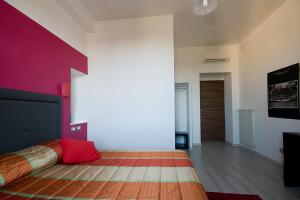 Postel nebo postele na pokoji v ubytování MF Hotel