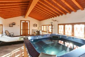 a large bathroom with a large tub in a room at Casa Vacanze Bellavista in San Casciano in Val di Pesa