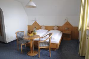 Postel nebo postele na pokoji v ubytování Hotel Lengsteinerhof