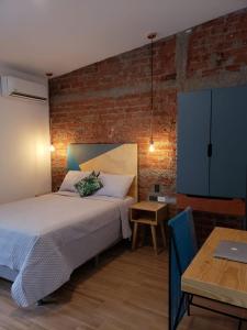 Ένα ή περισσότερα κρεβάτια σε δωμάτιο στο Hotel Citlalli