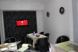 TV a/nebo společenská místnost v ubytování White Fort Hotel