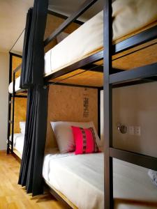 Voodi või voodid majutusasutuse Xplora Hostel Cusco toas