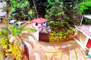 Giardino di Power Zone Guest House