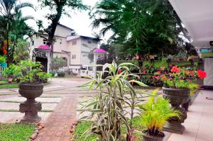 Giardino di Power Zone Guest House