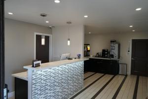 a kitchen with a counter top in a room at Muir Woods Lodge in Mill Valley