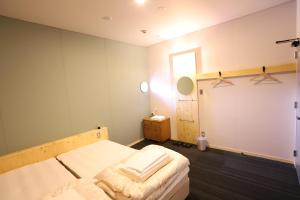 Postel nebo postele na pokoji v ubytování Hostel Tomar