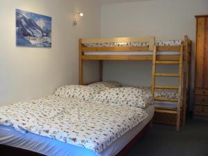 Posteľ alebo postele v izbe v ubytovaní Alpenappartements Domicil include Jokercard