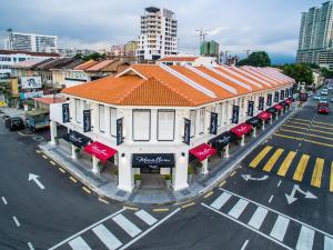 an overhead view of a street with a building at Macallum Central Hotel Managed by The Ascott Limited in George Town