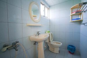 Koupelna v ubytování HaiAn Xian Homestay