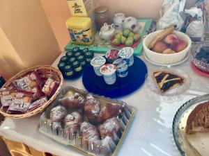 a table topped with different types of food at B&B Sole Luna in Perugia