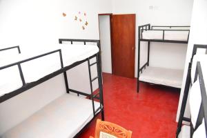 Krevet ili kreveti u jedinici u okviru objekta Lucky Beach Front Hostel