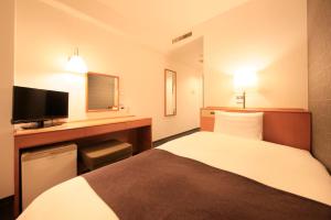 TV a/nebo společenská místnost v ubytování Smile Hotel Tokyo Ayase Ekimae