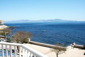a view of the ocean from a balcony at Rallye Hotel in L'Escala
