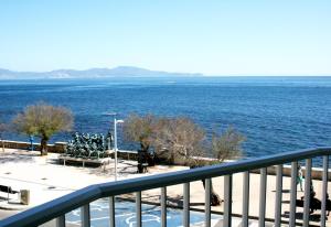 a view of the ocean from a balcony at Rallye Hotel in L'Escala