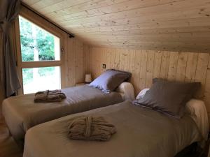 Postel nebo postele na pokoji v ubytování Gîte C 1.2.3 Soleil