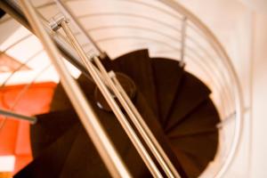 a close up of a spiral stair case at Melon Suites in Thessaloniki