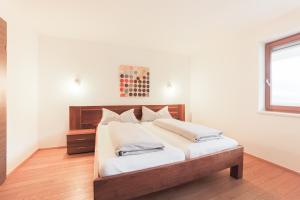 Postel nebo postele na pokoji v ubytování Apartment Eberharter