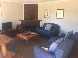 Posezení v ubytování Everwood Estates