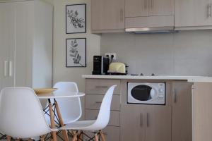 Kuchyň nebo kuchyňský kout v ubytování Aelia Apartments