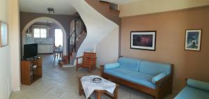 A television and/or entertainment centre at Lakonia Bay Apartments