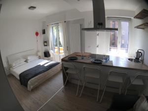 A bed or beds in a room at Maison SAGM&C