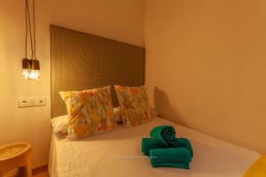 Postel nebo postele na pokoji v ubytování tuGuest Clave de Sol Apartment