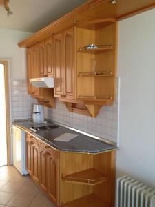 Kuchyňa alebo kuchynka v ubytovaní Kosztolányi Apartmanház