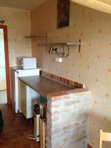 Kuchyňa alebo kuchynka v ubytovaní Kosztolányi Apartmanház