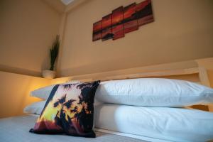 A bed or beds in a room at Sea Station