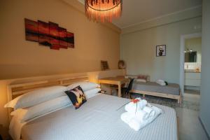 A bed or beds in a room at Sea Station