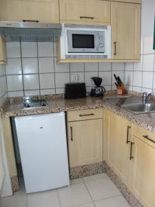 Kuchnia lub aneks kuchenny w obiekcie Moderno apartamento con vistas al mar