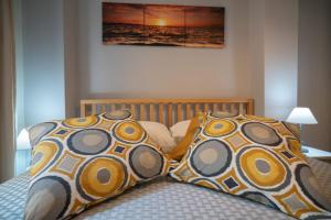 A bed or beds in a room at Sea Station