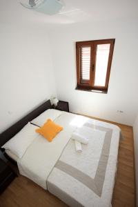 Säng eller sängar i ett rum på Vila Orada