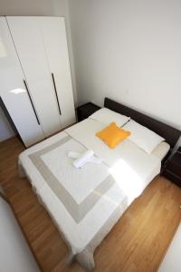 Postel nebo postele na pokoji v ubytování Vila Orada