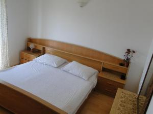 Postel nebo postele na pokoji v ubytování Radojka