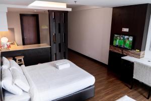 Postel nebo postele na pokoji v ubytování Classy Studio Apartment (KBCP)