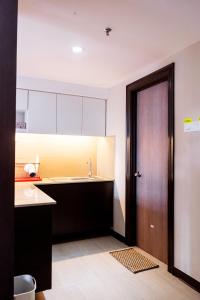 Kuchyň nebo kuchyňský kout v ubytování Classy Studio Apartment (KBCP)