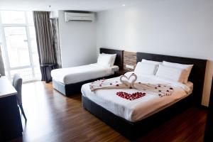 Postel nebo postele na pokoji v ubytování Classy Studio Apartment (KBCP)