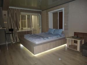 A bed or beds in a room at Васильева 1