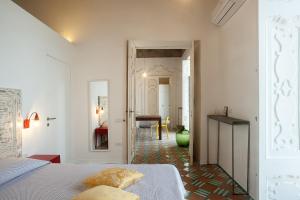 A bed or beds in a room at Il Rigiuolo - Holiday Home