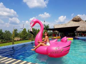 Bazén v ubytování Hacienda Isabela Hotel Campestre nebo v jeho okolí